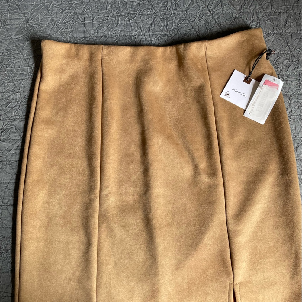 Suede shorter skirt with small slit